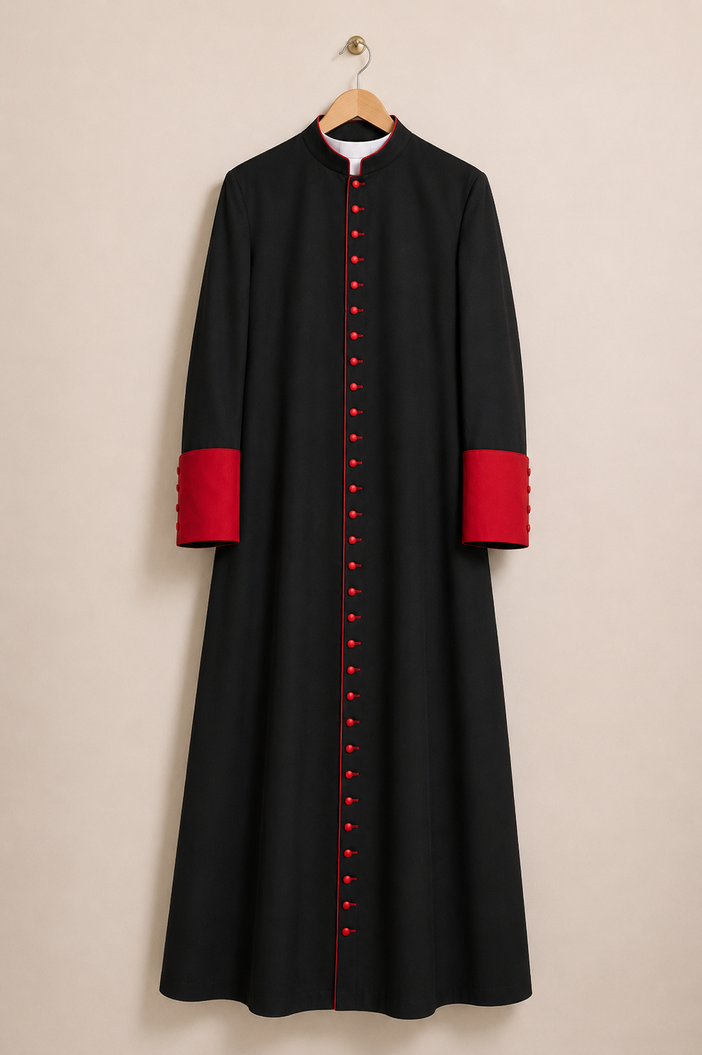 Black men's clergy cassock with contrasting red cuffs, red piping, and a red-trimmed collar