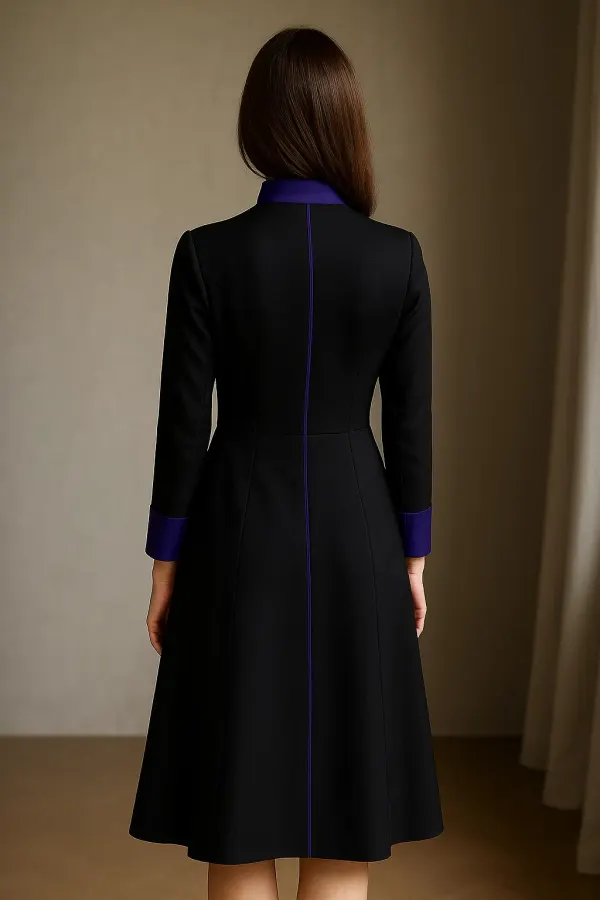 Black women's clerical dress with a structured mandarin collar and long sleeves with button cuffs