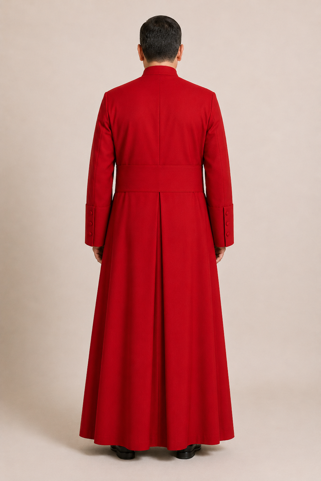 Back view of a deep red men's clergy cassock with full-length covered red buttons