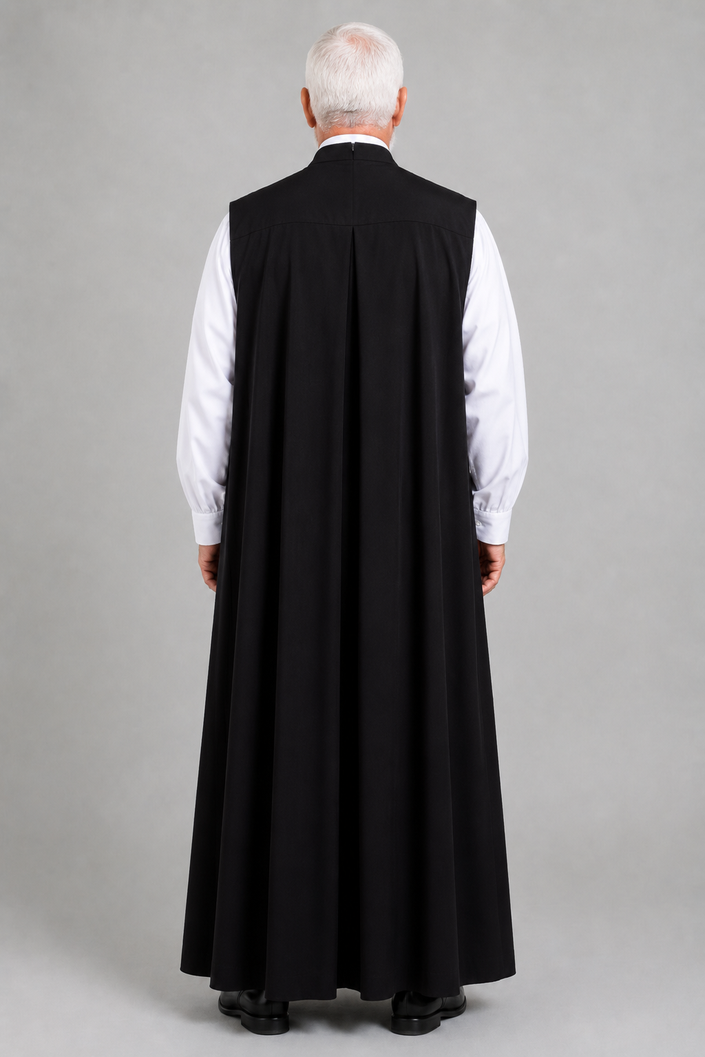 Back view of a black traditional chimere with an open front and smooth drape