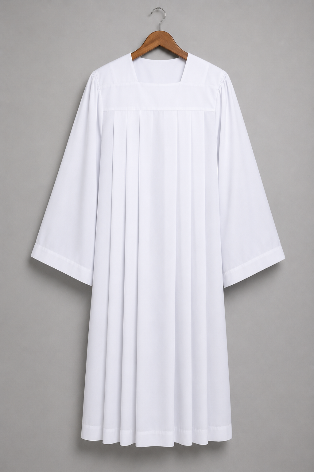 White men's surplice vestment with a straight yoke panel, worn over a black cassock