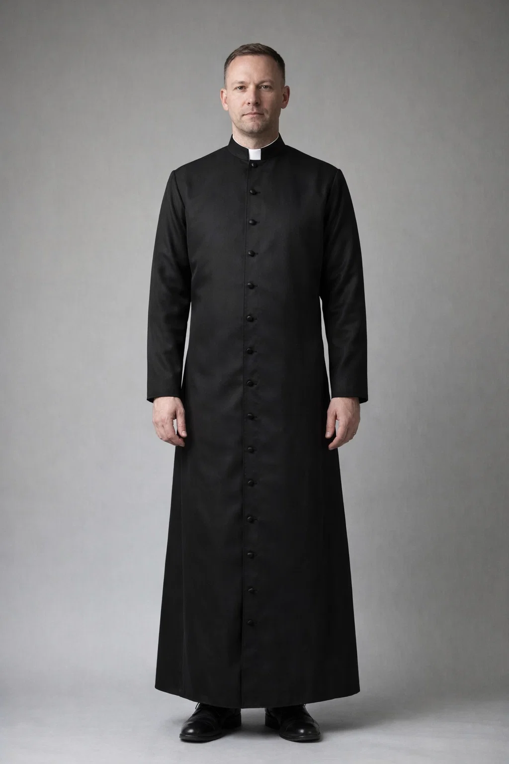 A clergy wearing Men Wearing Canonus Traditional Black Dress