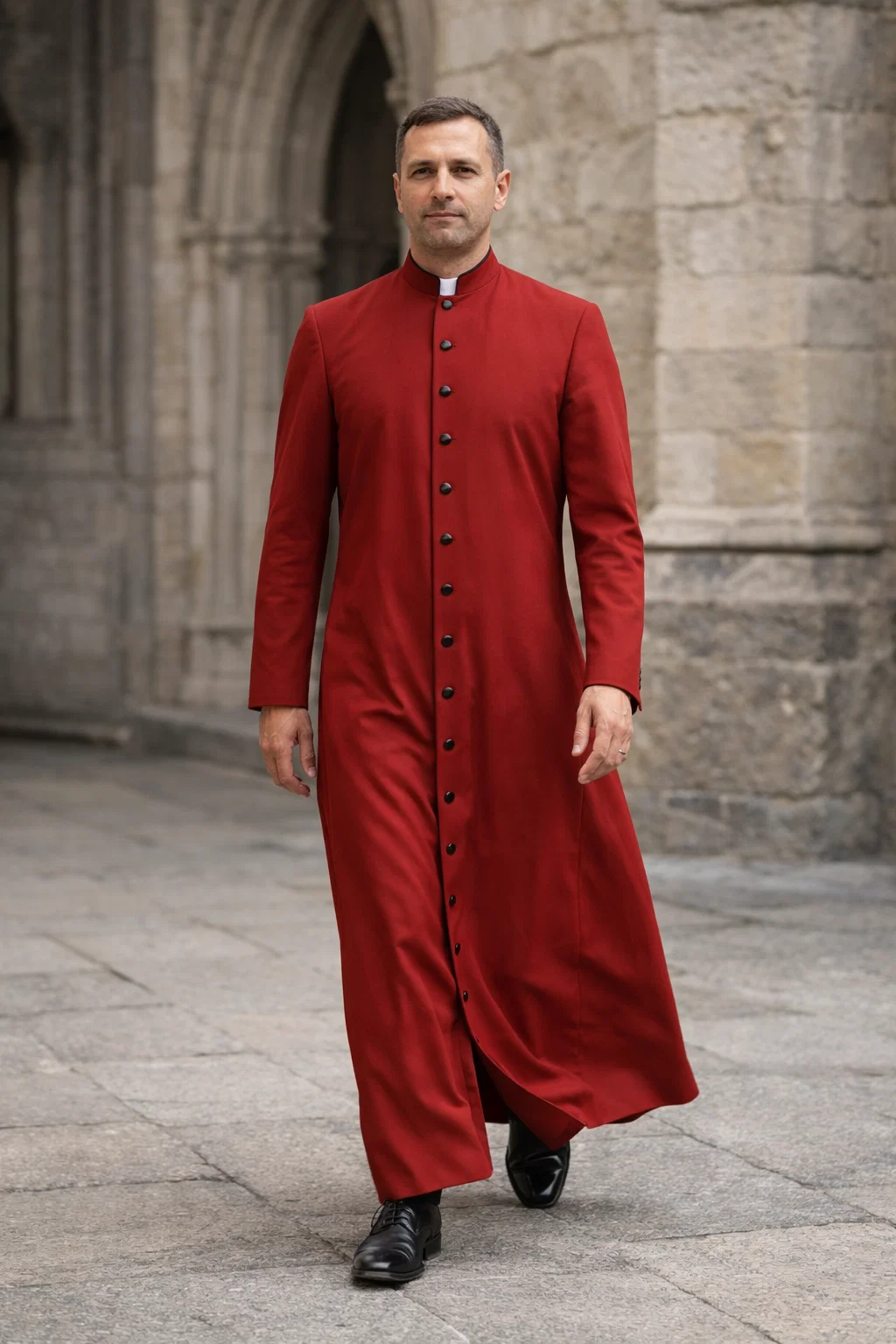 A Walking Men Wearing Martyrus Traditional Red Cassock