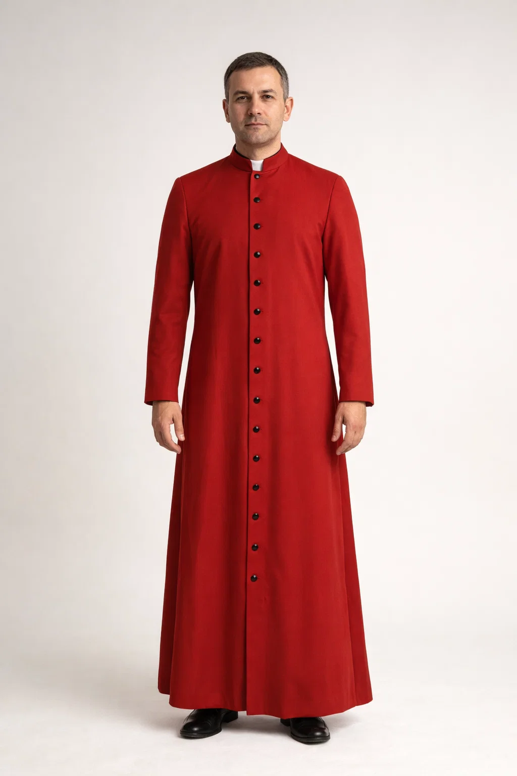 A men wearing Martyrus Traditional Red Cassock